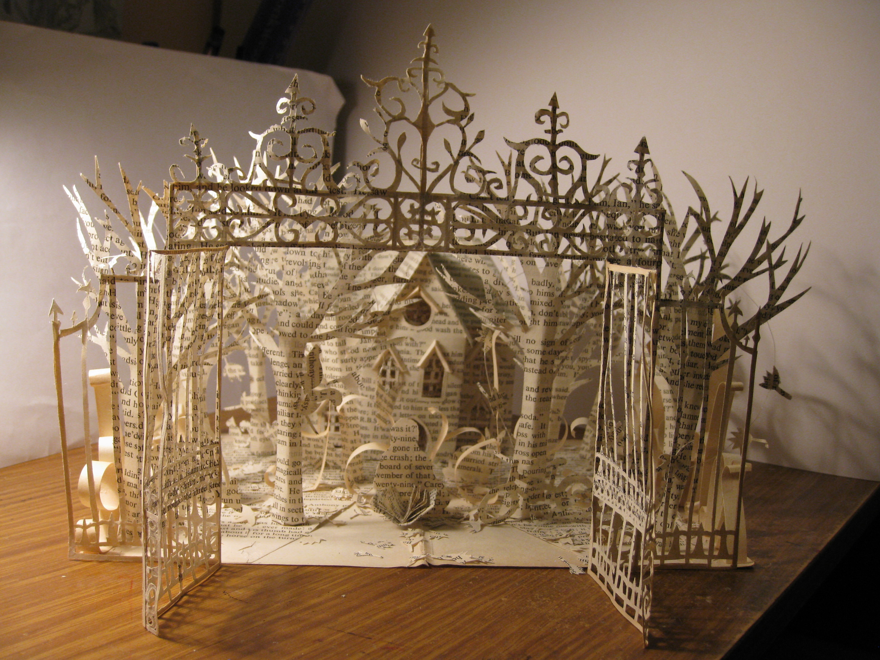 a book is a garden in the pocket 纸雕