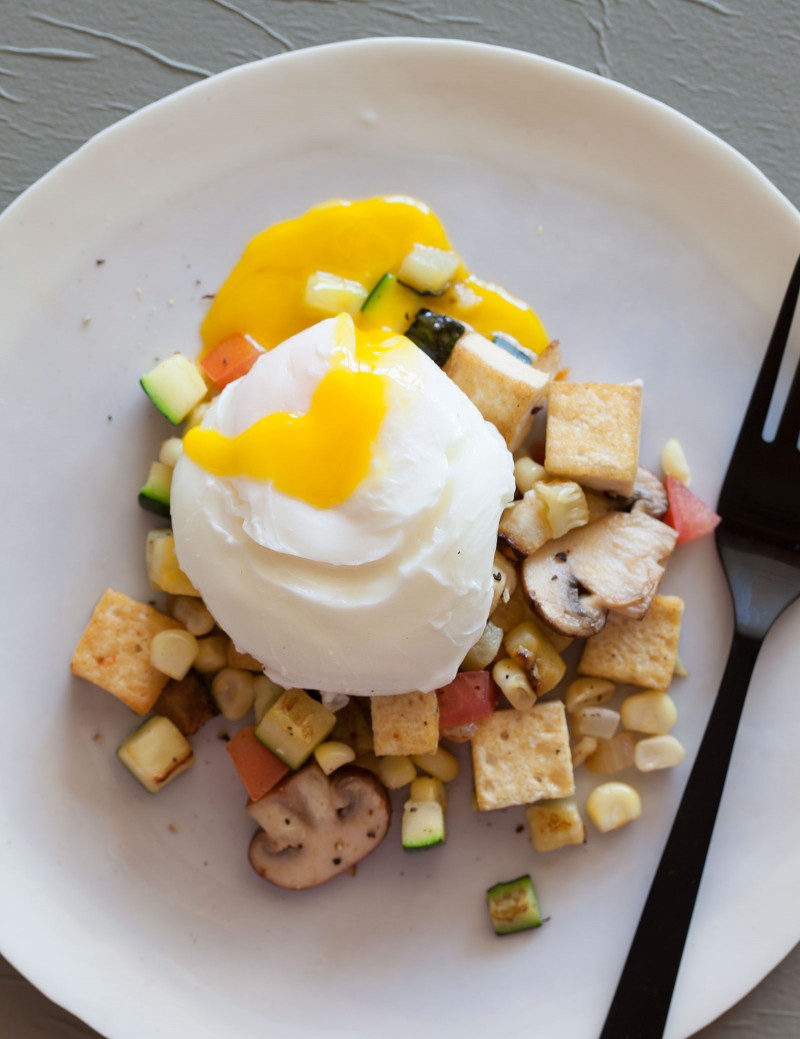 a tofu scramble with a perfectly poached egg.#b162