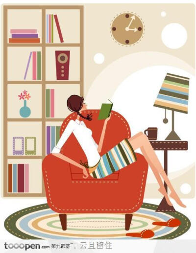 坐在沙发上看书的女孩