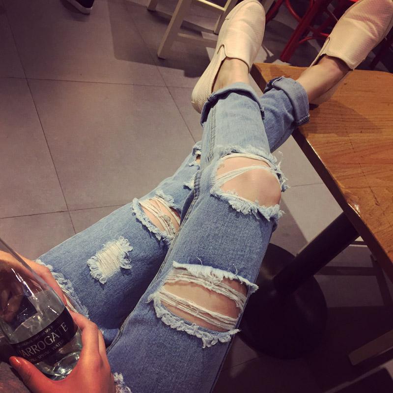 2015春装女裤浅蓝色夸张破洞牛仔裤女式做旧小脚裤长裤潮jy01