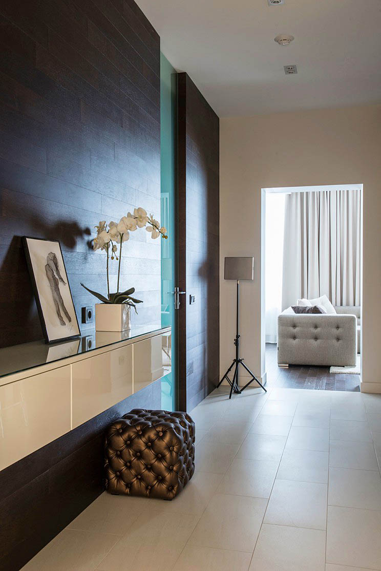 设计师通过巧妙的空间布局和颜色搭配,将这套只有60平方米的公寓设计