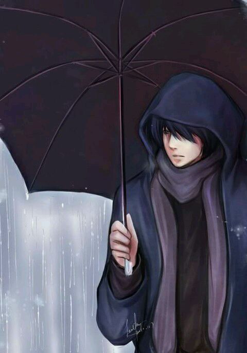 雨中黑伞下的小哥在看什么呢?