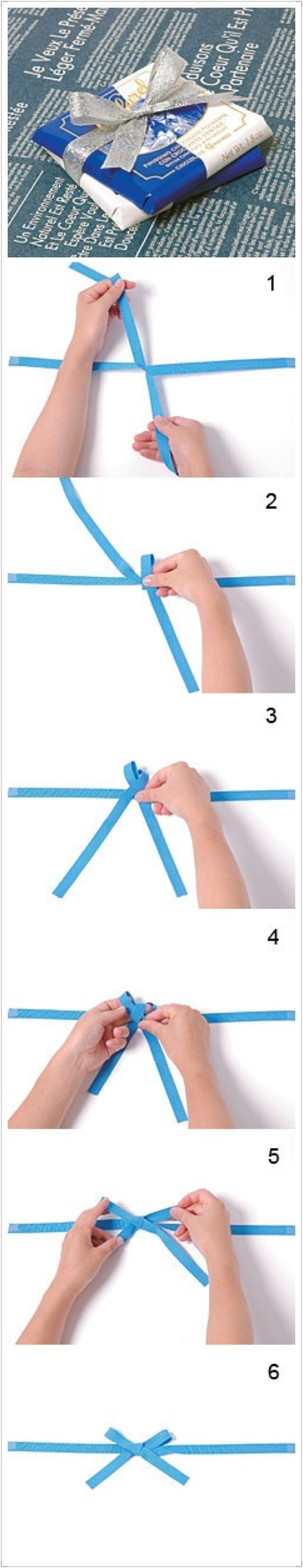 蝴蝶结的系法: 1把丝带的两头打一个结 2