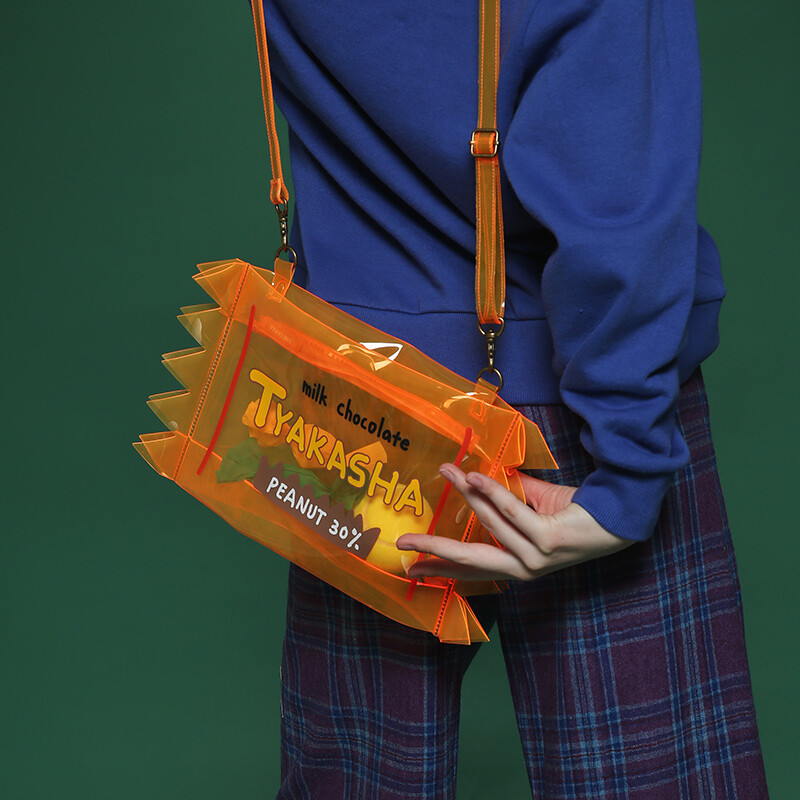 tyakasha塔卡沙包装系列橘色pvc印花斜挎包sbn97 921发货