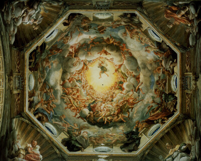 画家柯雷乔把天堂画在顶正中,周围是环绕天堂的一群天使,他们簇拥着