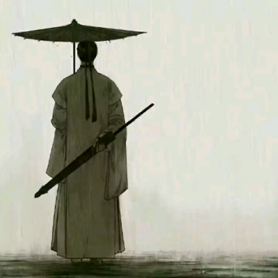 雨中的男人撑伞图片