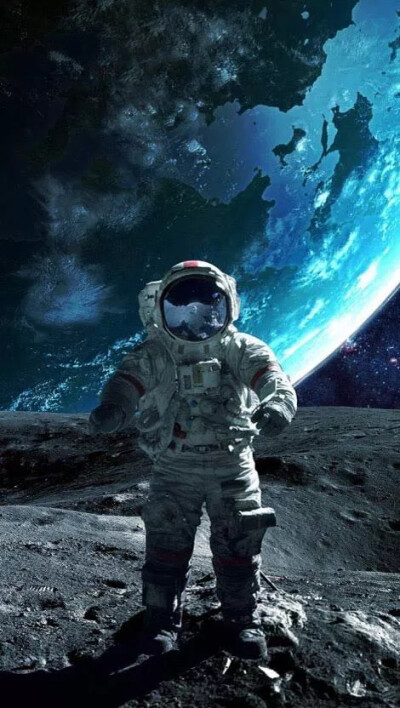 宇航员侧边吊星球壁纸图片