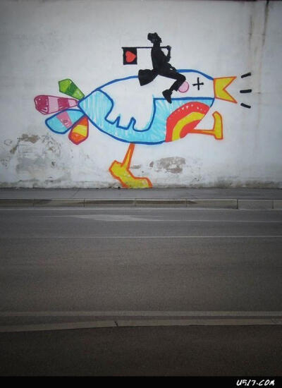 random是意大利的一名街头艺术家,他在帕多瓦的街道墙壁上随意地涂鸦