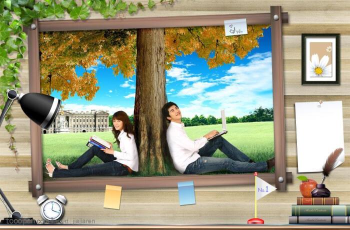 墙壁相框内背靠大树的大学情侣照片