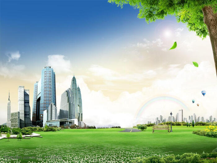 蓝天白云草地上的城市高层建筑 树干树叶
