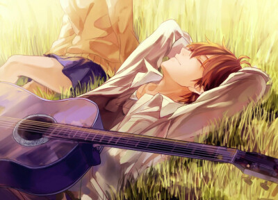 躺在草地上的吉他少年,优十