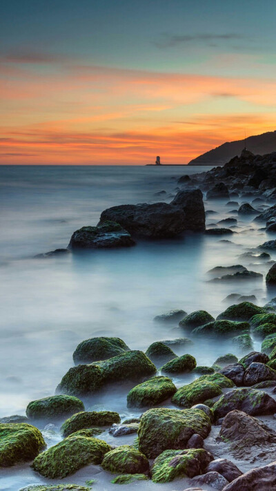 海边落日—华为杂志锁屏夕阳落下的暮色总是带有一种诗意的浪漫,让人