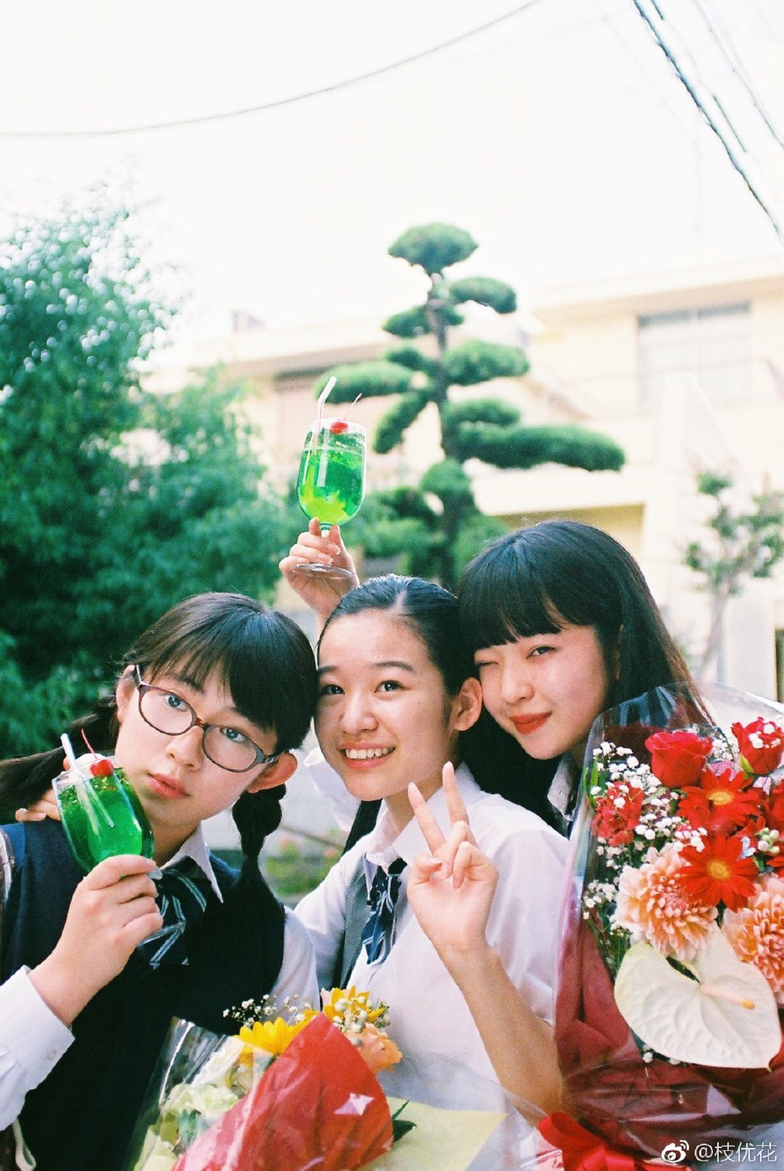 three high school girls gather in a coffee sh