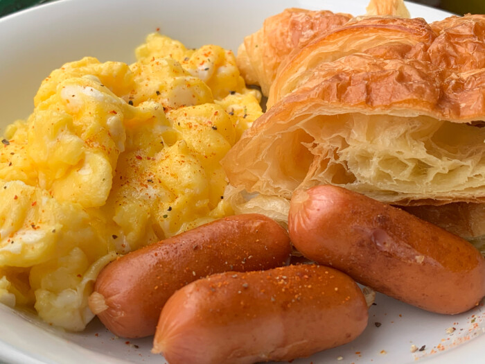 all day breakfast scrambled egg croissant with baby sausages